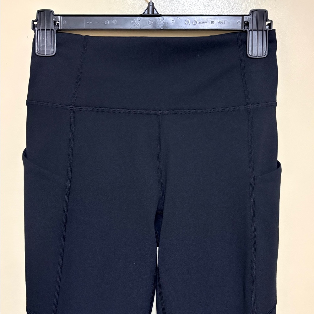 Fabletics Oasis High Waisted 7/8 Black Leggings - Picture 4 of 5